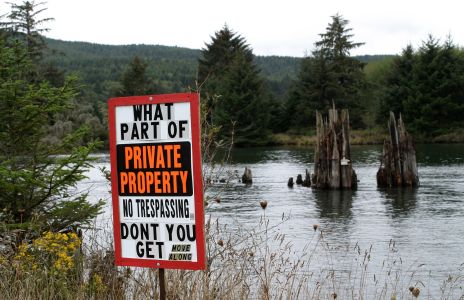 Sign Near Old Dock Pilings on Siletz River